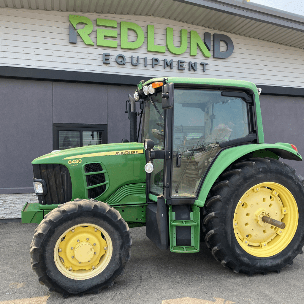 2011 John Deere 6430 1657 Hours with 115 HP engine, 103 PTO HP, 4WD, 1657 hours, Premium Cab, Deluxe Radio, Greenstar Auto Trac, Cat3/3N hitch with 10,697lb capacity, three remote cylinder control, Cold Weather Package, and Premium Light Package.