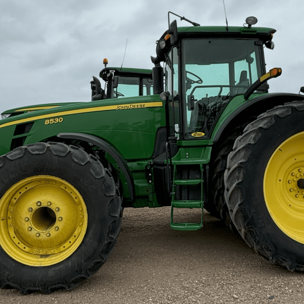 Immaculate John Deere tractor with 330 HP, IVT 40K transmission, MFWD, 7100 hours, rear 3pt hitch at 18,300#, 4 hydraulic outlets, 22 front weights, dual tires, guidance ready, and 1000 PTO speed—ready to handle any heavy-duty task.
